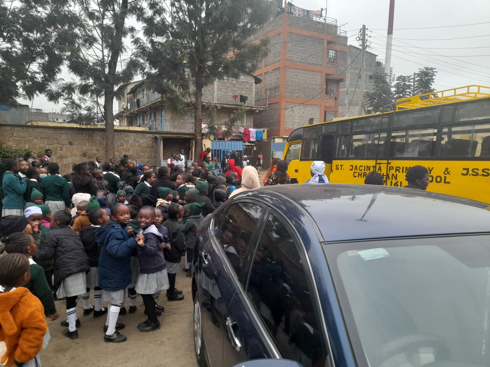 Learners boarding the school bus at St. Jacinta
